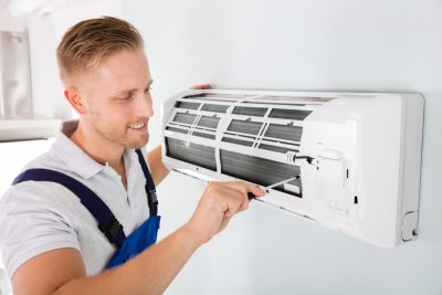 Important-Considerations-for-AC-Installation-and-Update – Copy HVAC technician cleaning and repairing a ductless mini split AC in Windsor, CO
